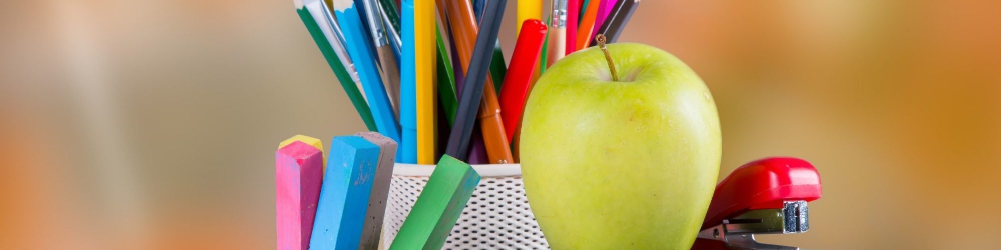 Picture of School Supplies and Apple