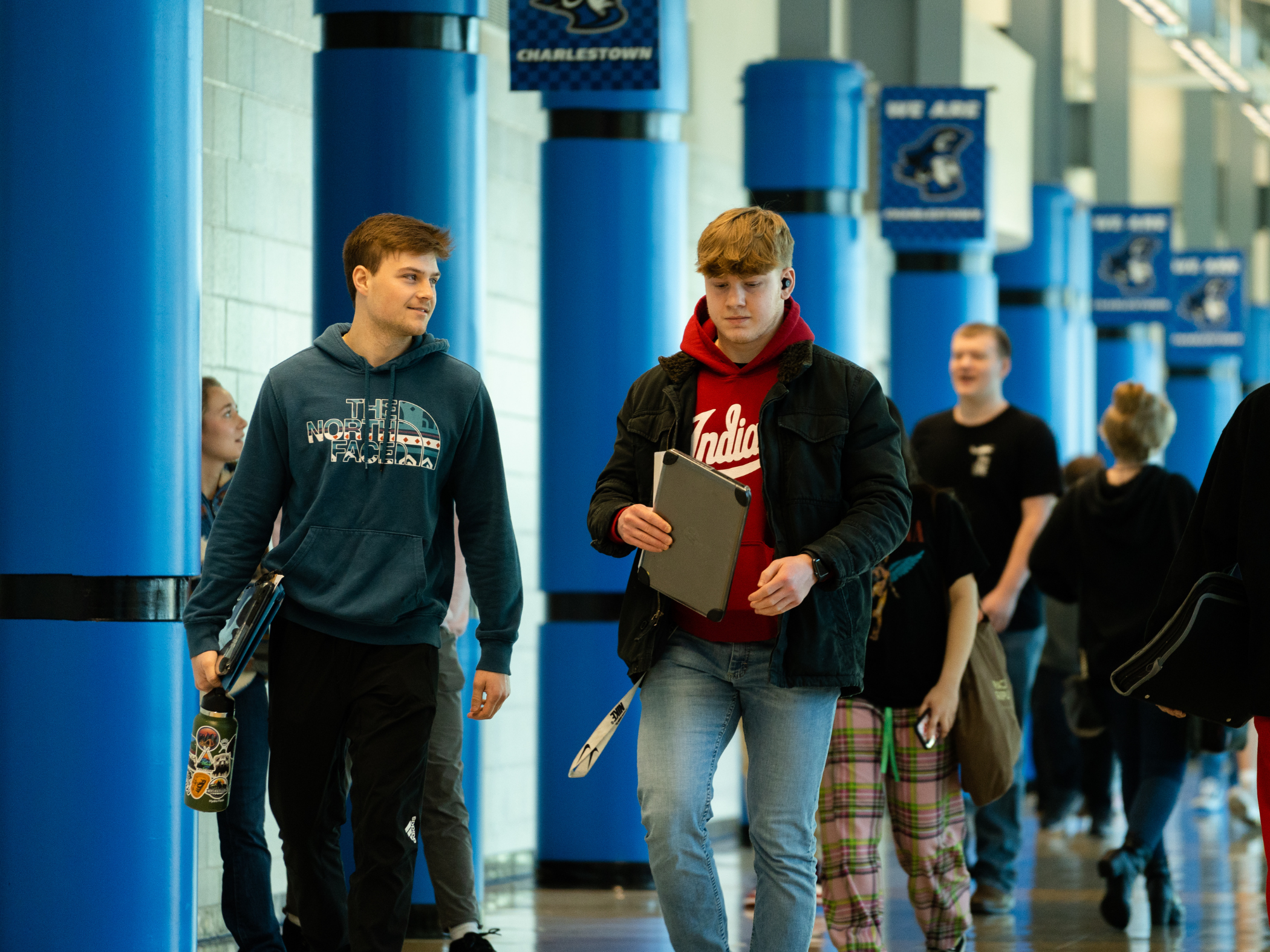 Students walking down the hallway